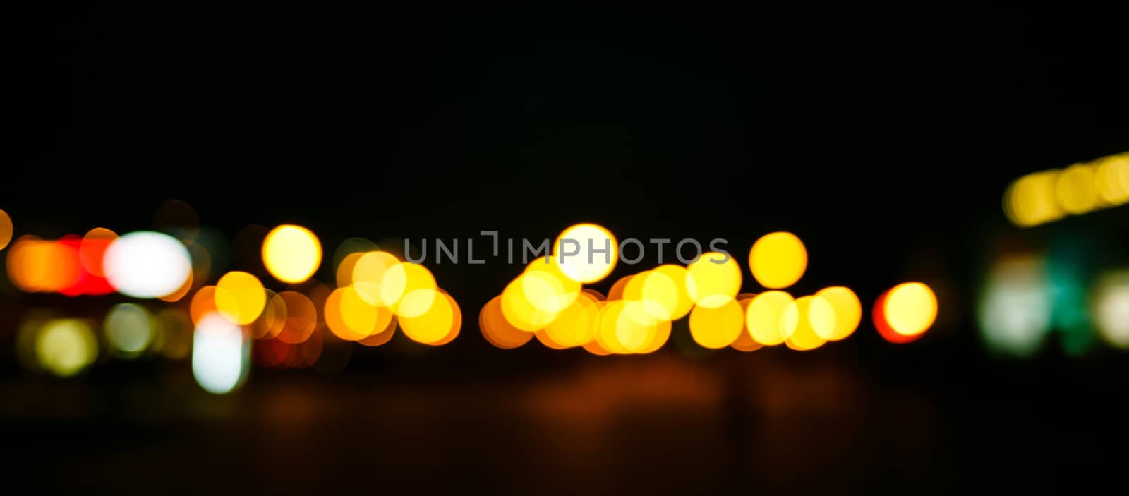 Abstract defocused lights of the night city bokeh background