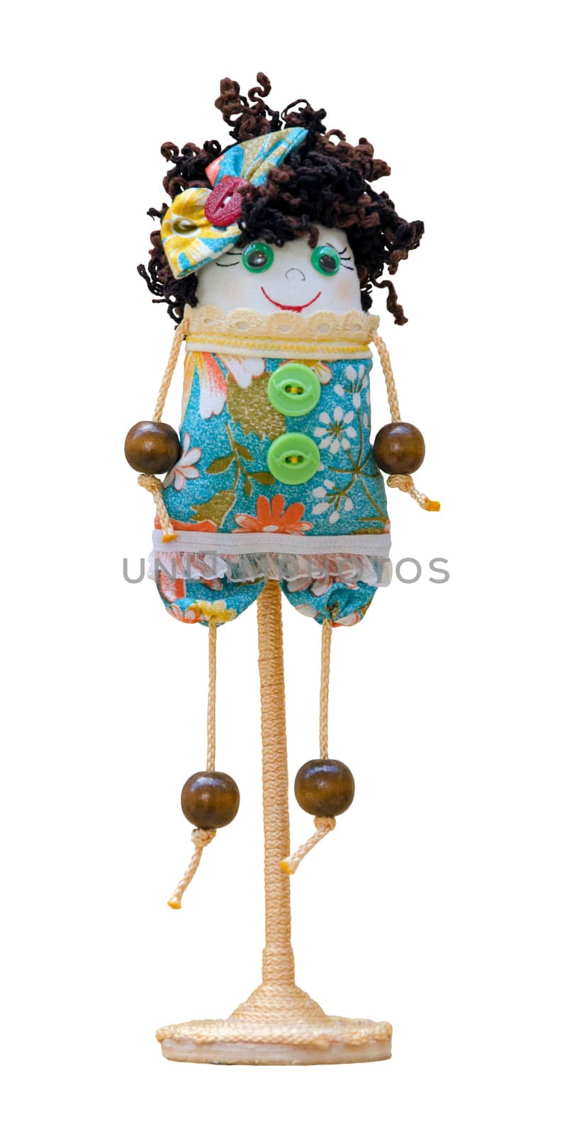 Handmade doll soft toy isolated funny girl on the stand by pt-home
