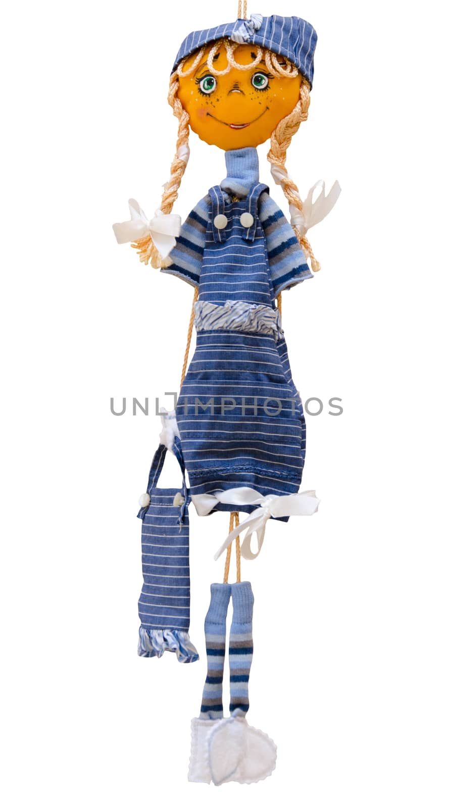 The handmade doll toy isolated thin cheerful girl in  striped dress with bag