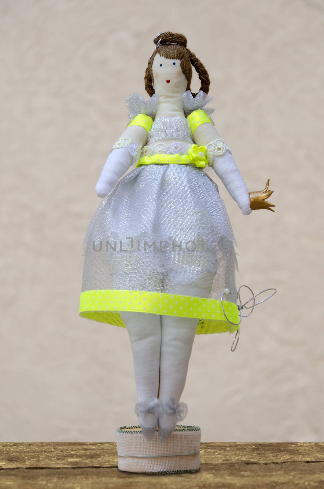 Handmade doll plump princess with a crown in the hands of the st by pt-home