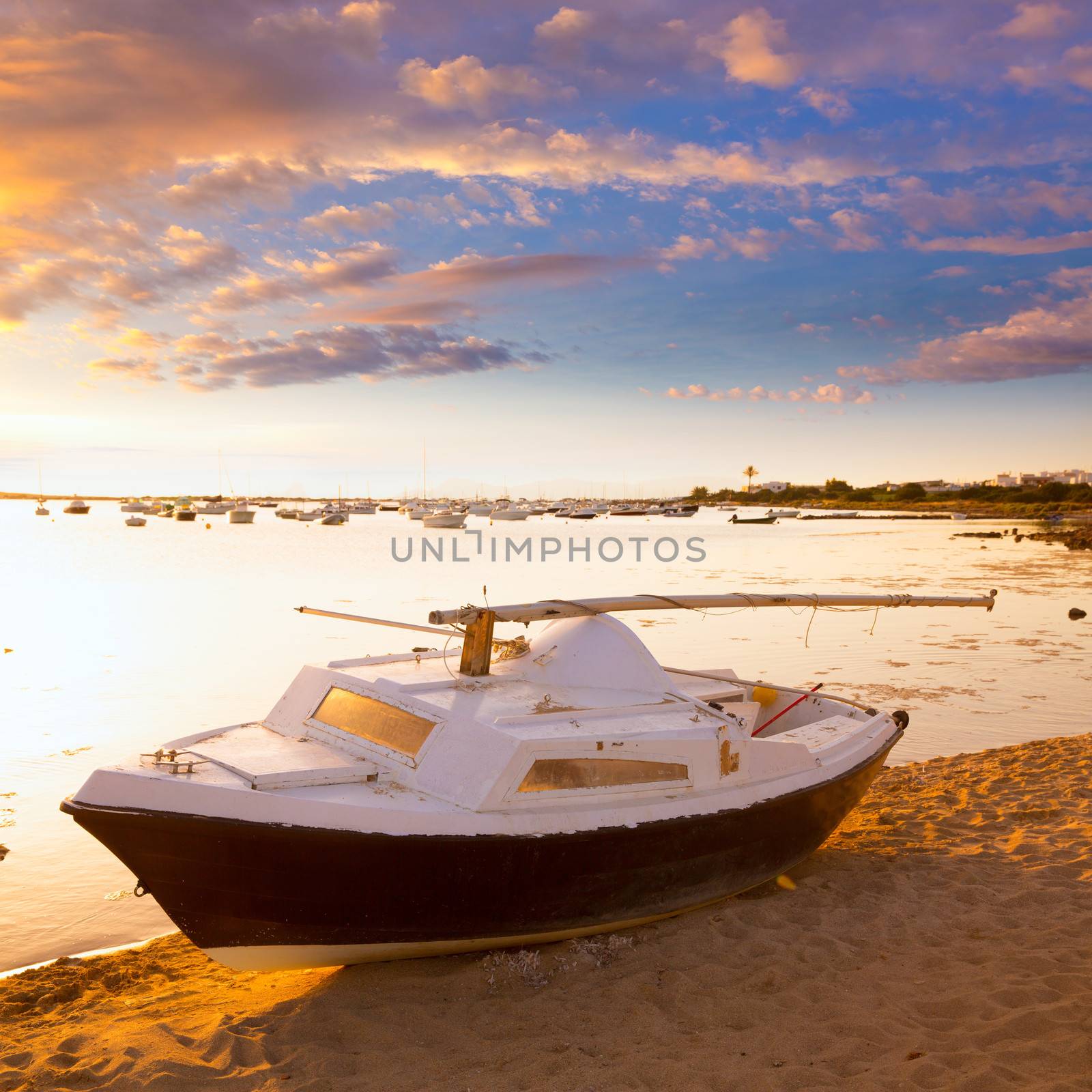 Beached sailboat sunset Estany des Peix in Formentera Balearic Islands of Spain