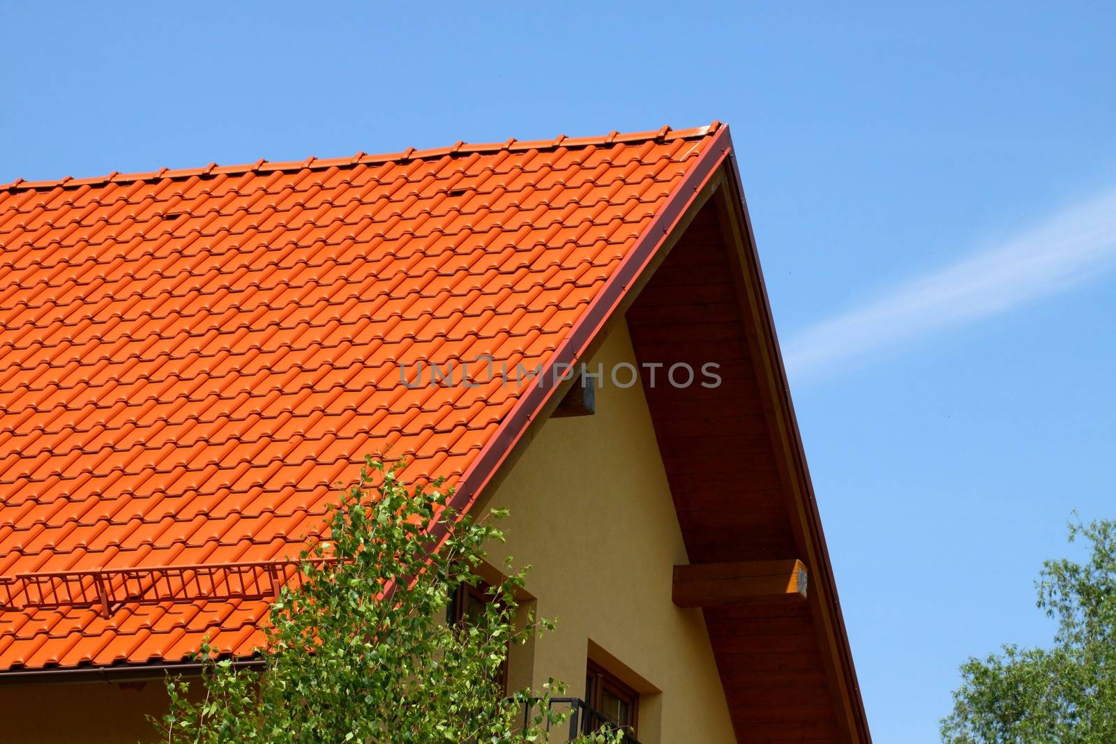 red roof on blue sky background