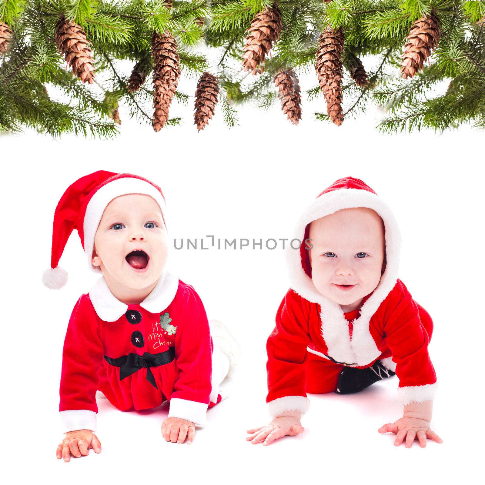 Funny little santa girl and boy isolated on white