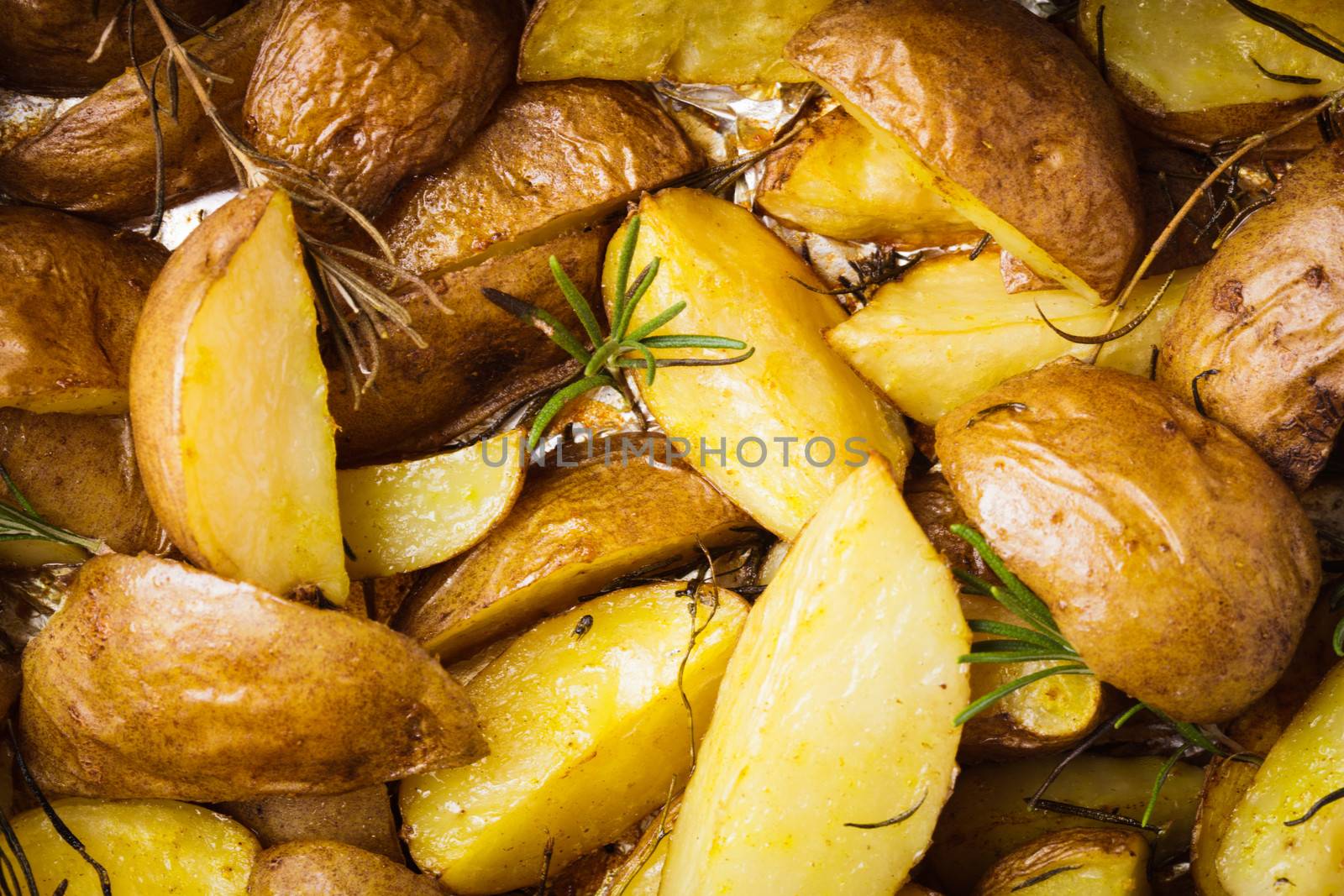 Rusic style potato  with rosemary baked in foil