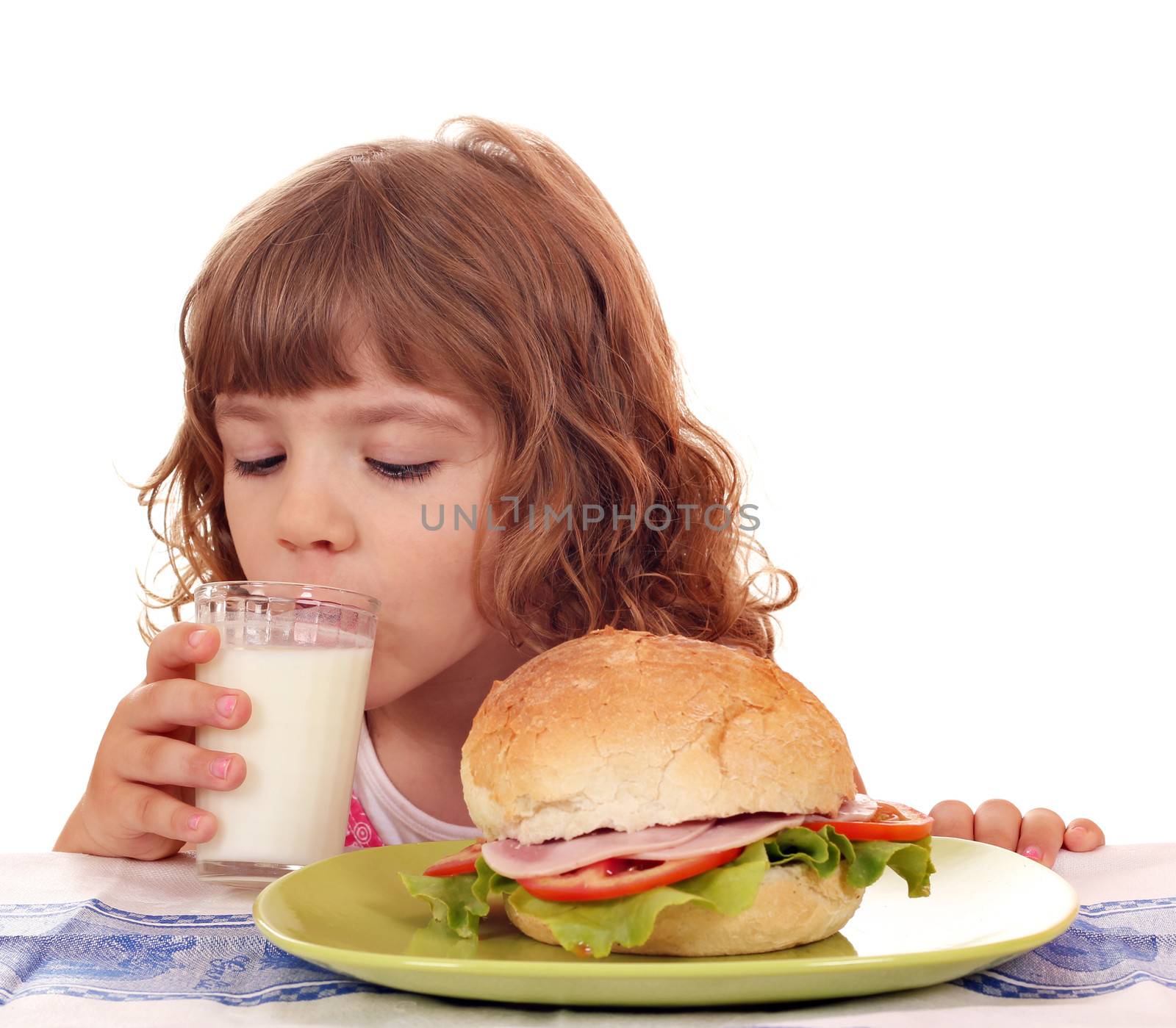 hungry little girl breakfast time