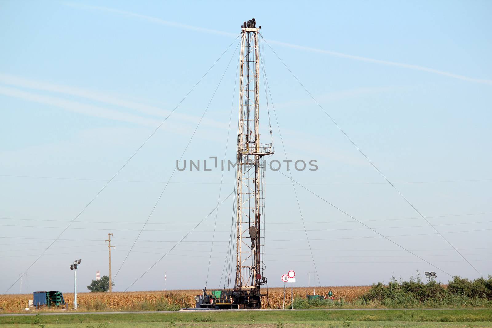 oilfield with oil drilling rig