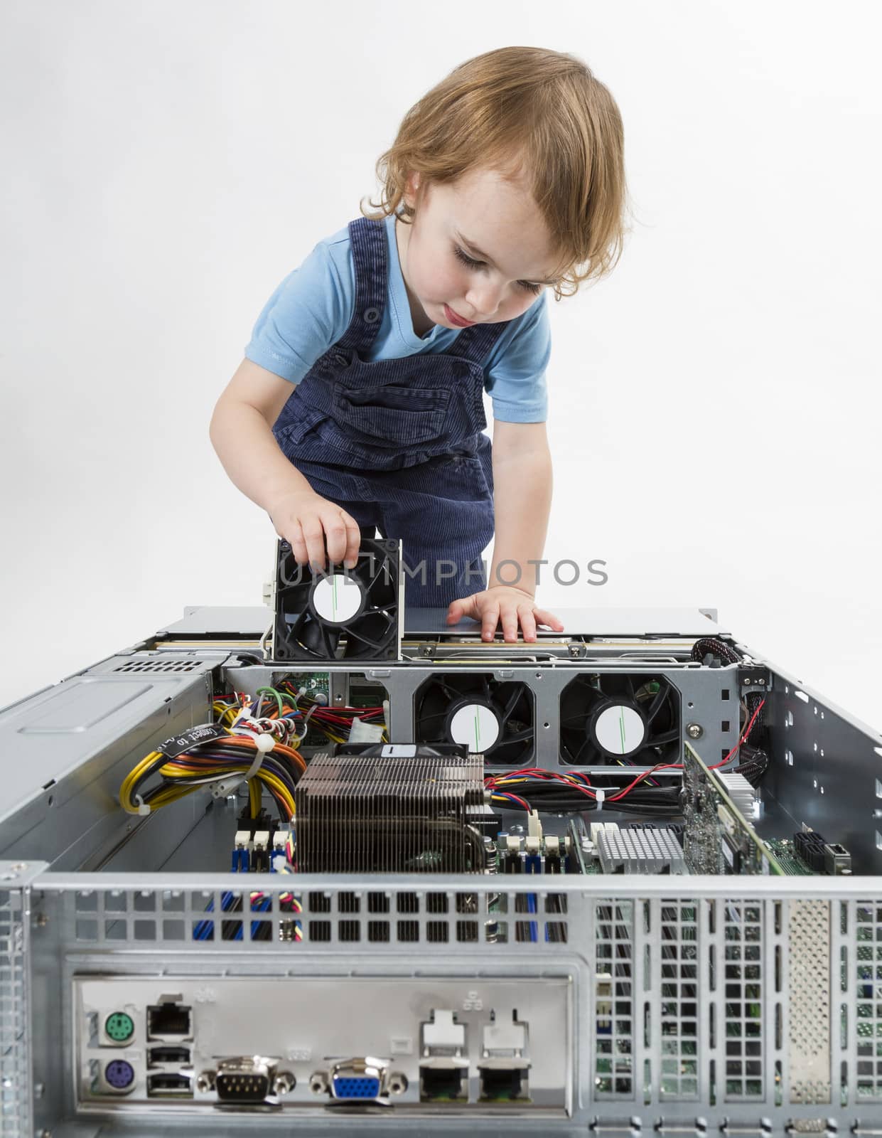 cute child with open network server. studio shot in light grey background