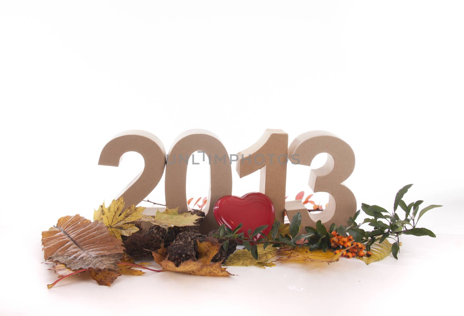 Year in numbers with autumn leaves and other product for New Year