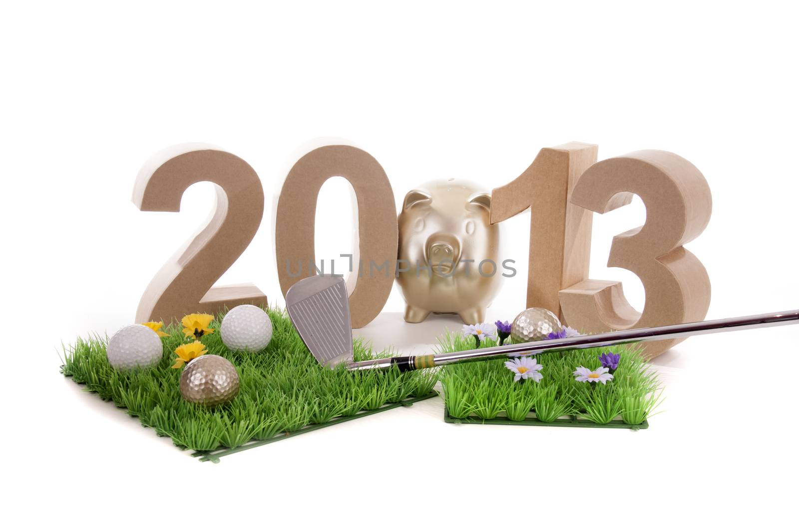 Golfstick and green symbolizes golfsport in the New year