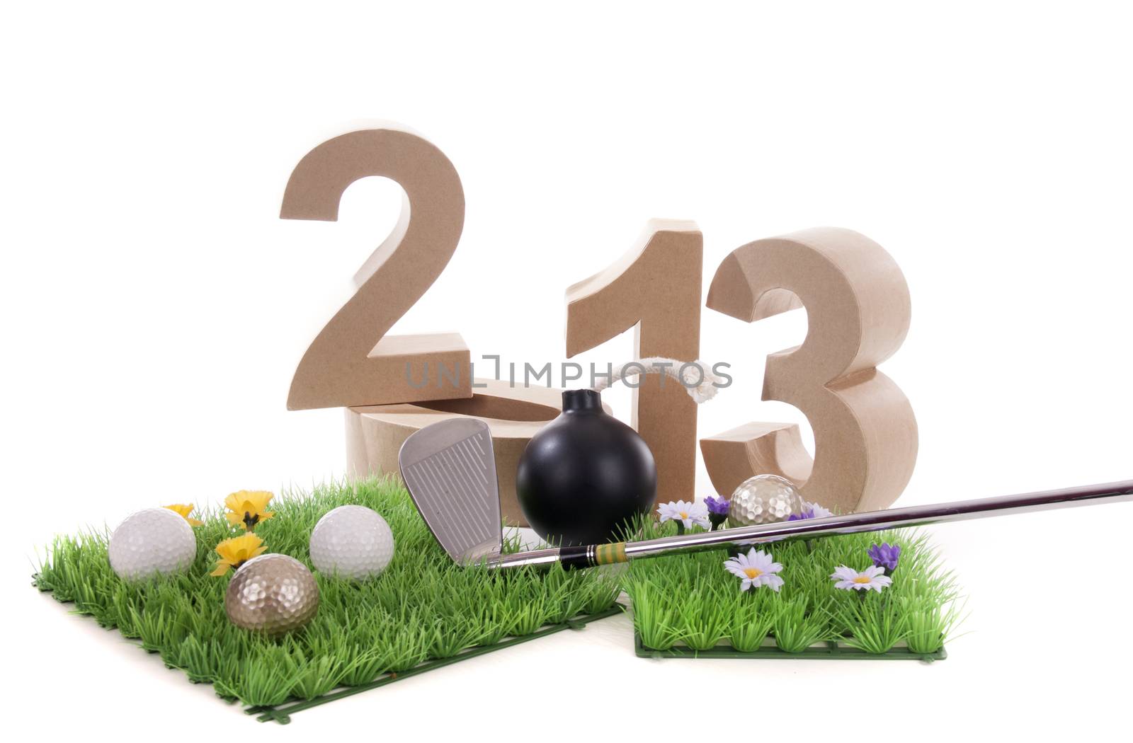 Golfstick and green symbolizes golfsport in the New year