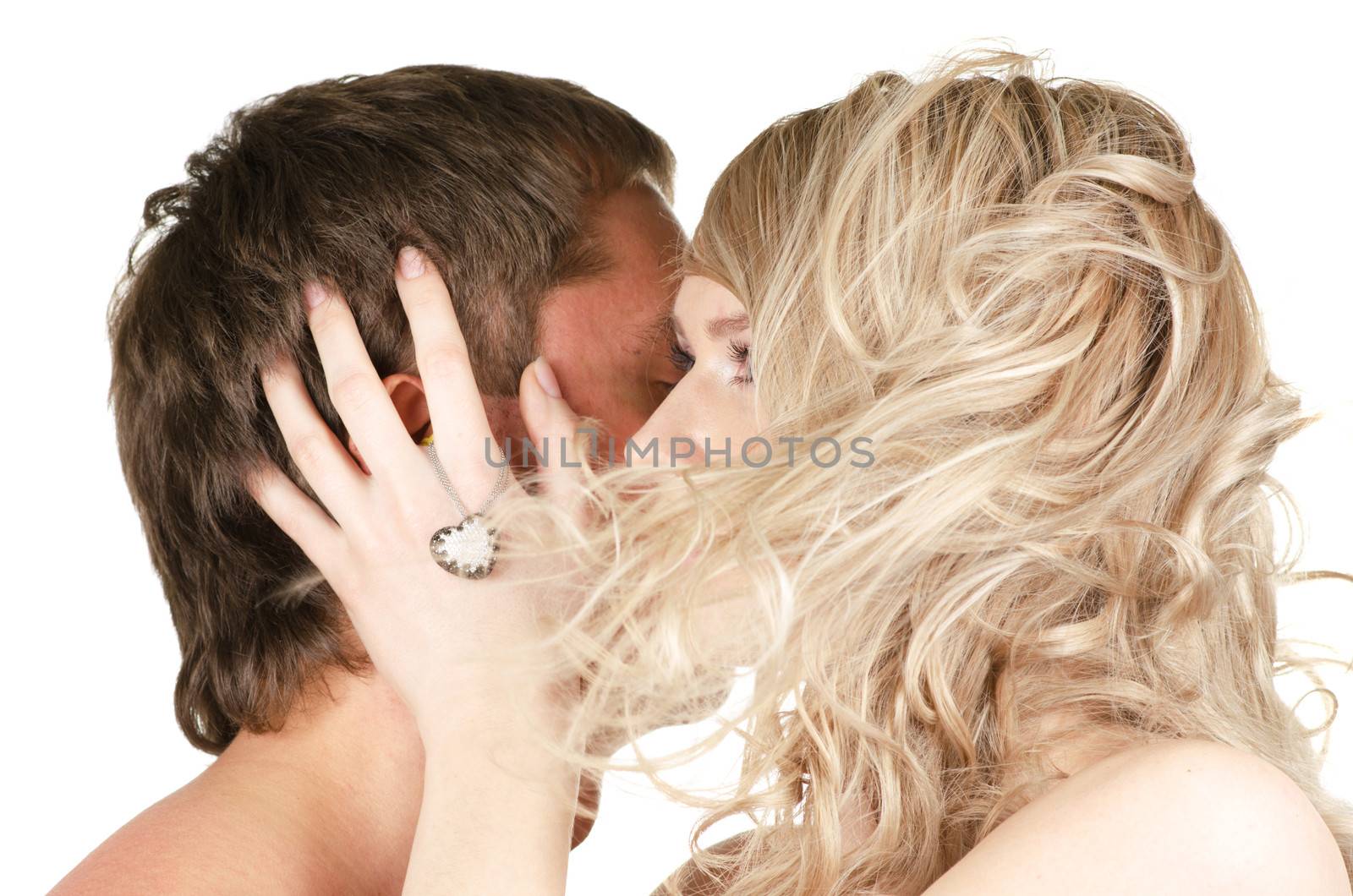 Kissing man and woman - lovers closeup portraits