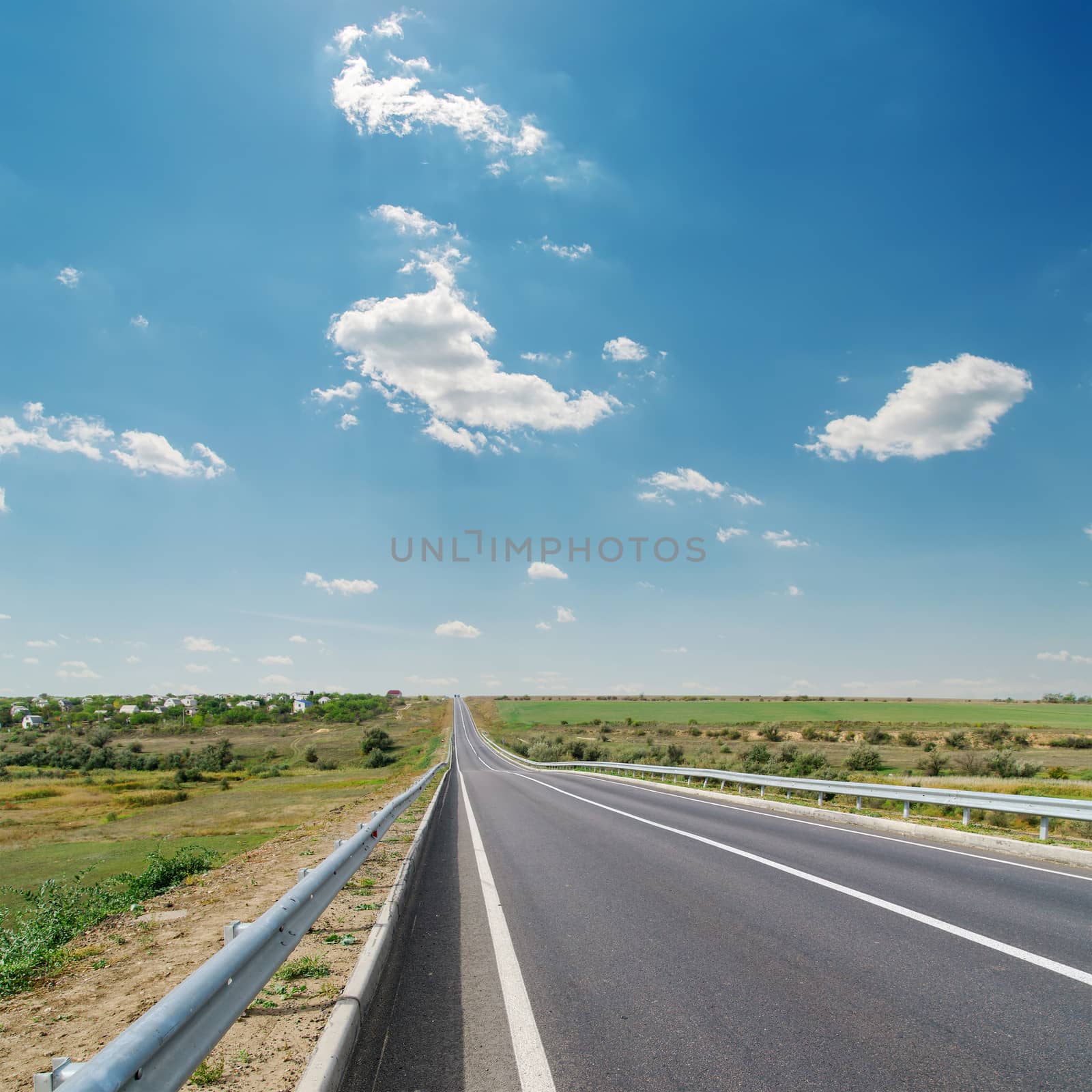 asphalt road and blue sky