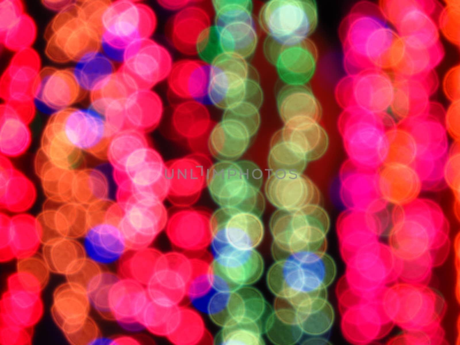 A blur background of colorful festival lights used for decoration.