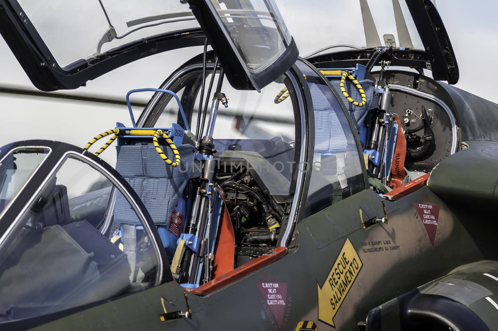 Detailed view of a fighter jet airplane cockpit.