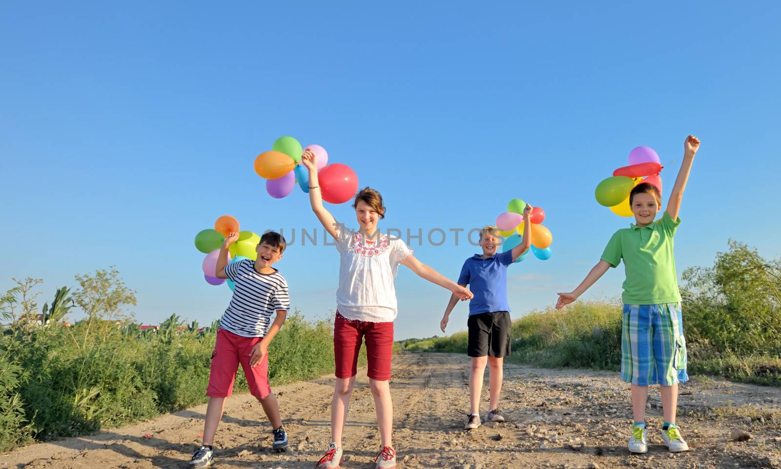 happy children with colorful balloons  by mady70