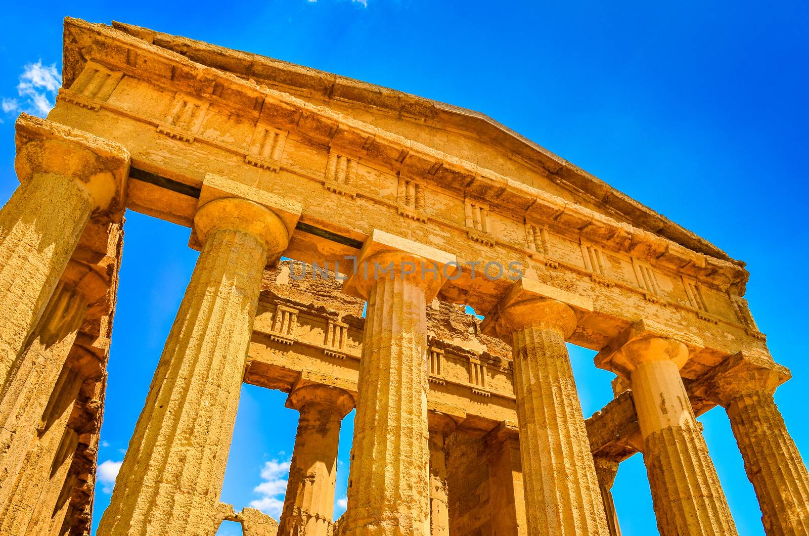 Ruins of ancient temple front pillars in Agrigento, Sicily by martinm303