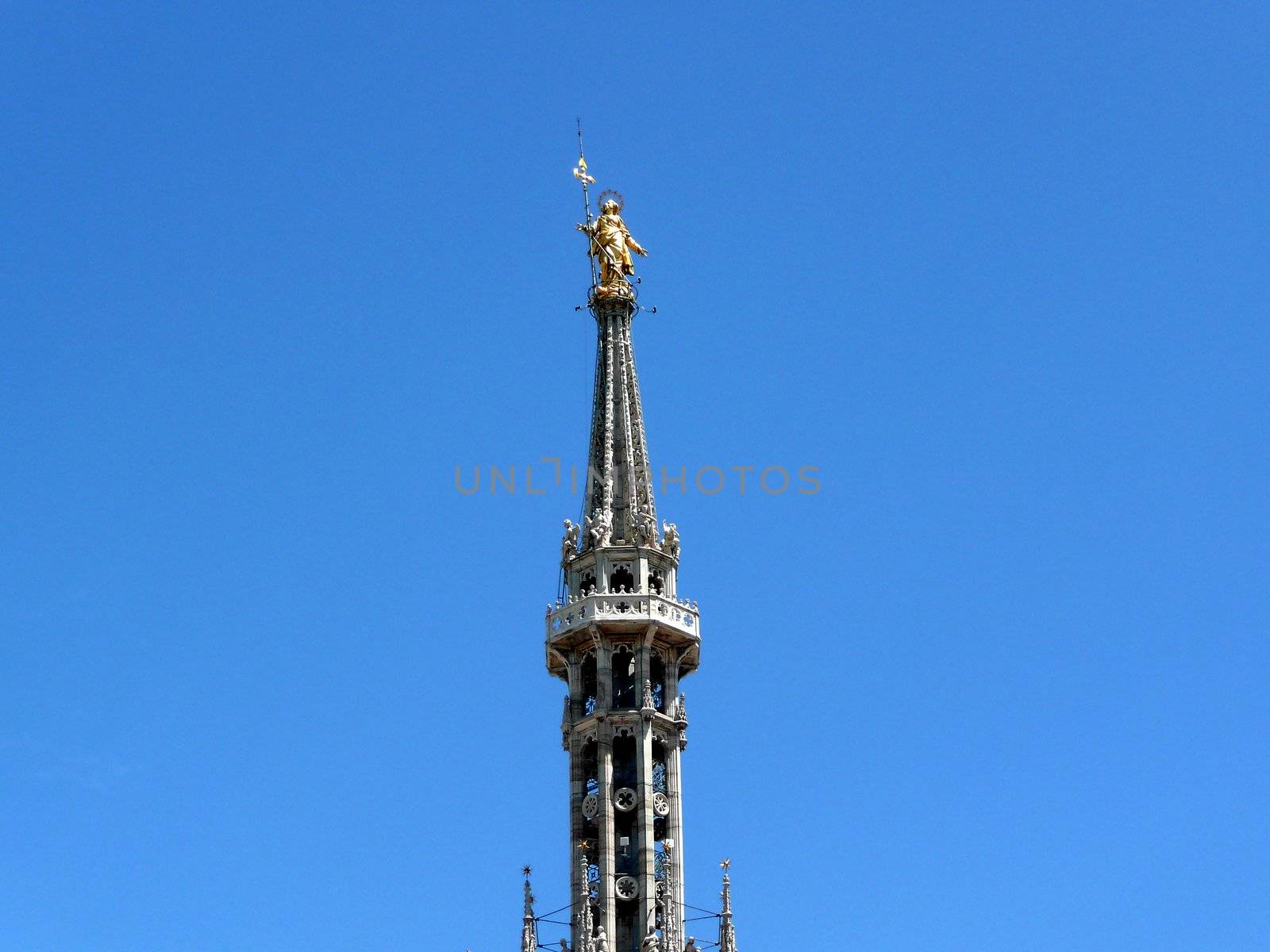 Madonnina Statue on the top of Milan Cathedral, Italy by marcorubino