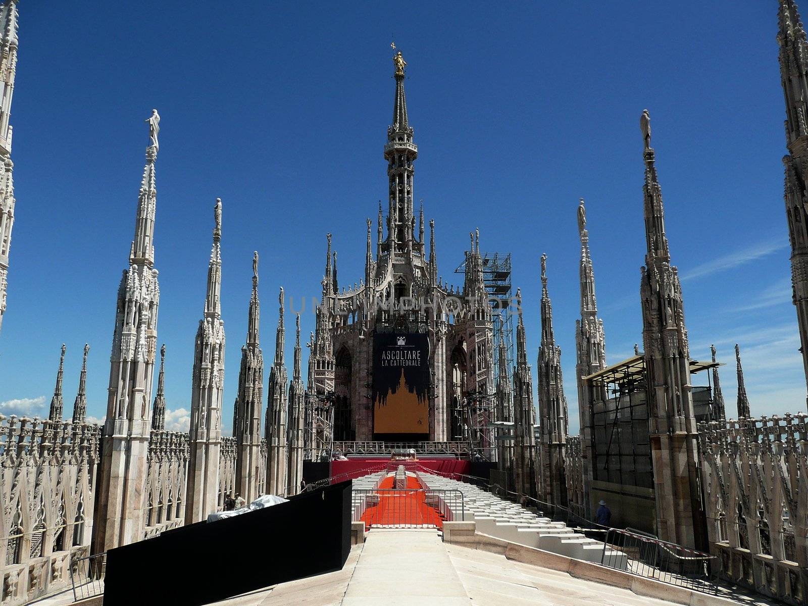 Madonnina Statue on the top of Milan Cathedral, Italy by marcorubino