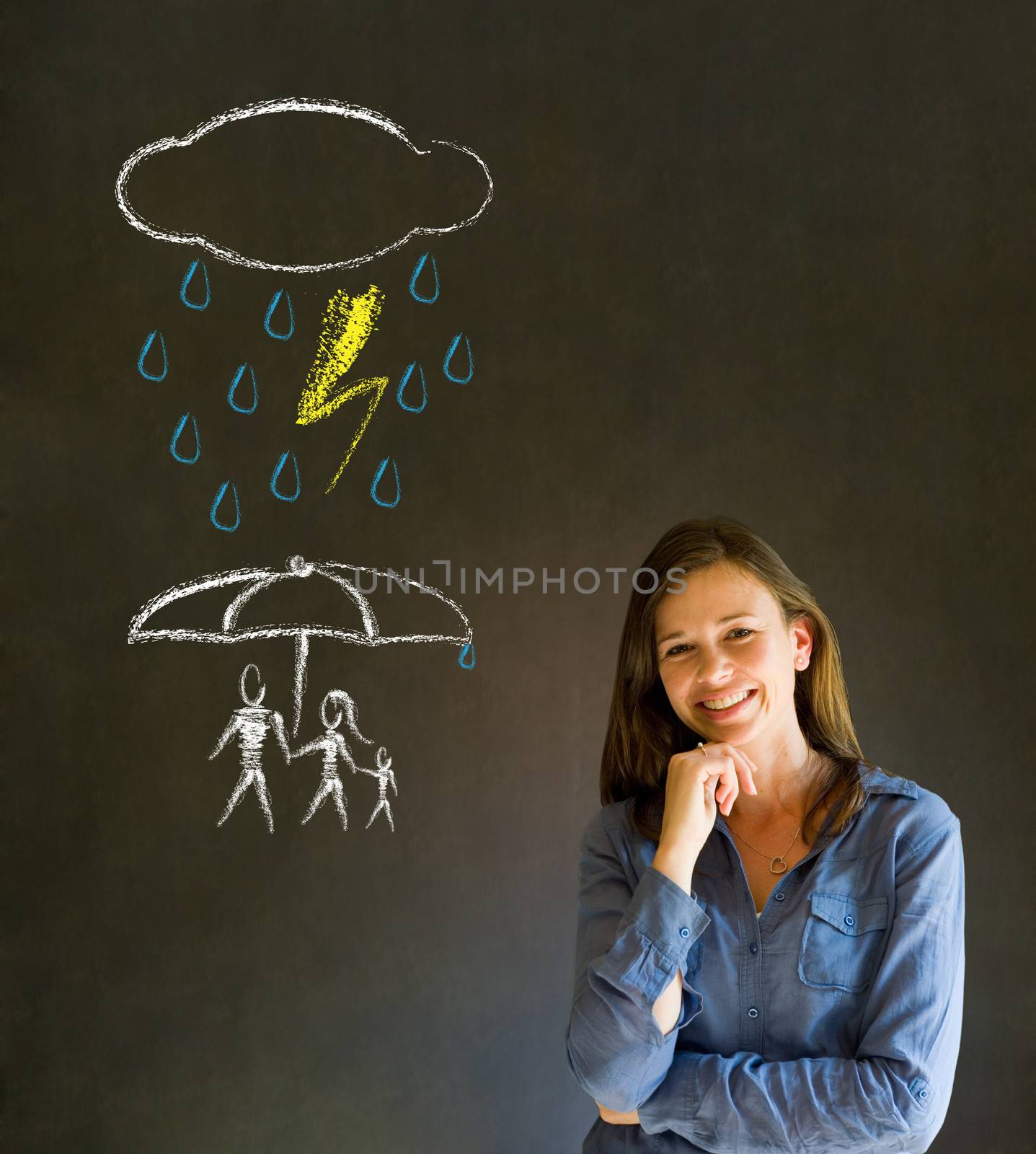 Woman Teacher thinking about protecting family from natural disaster on blackboard background by alistaircotton