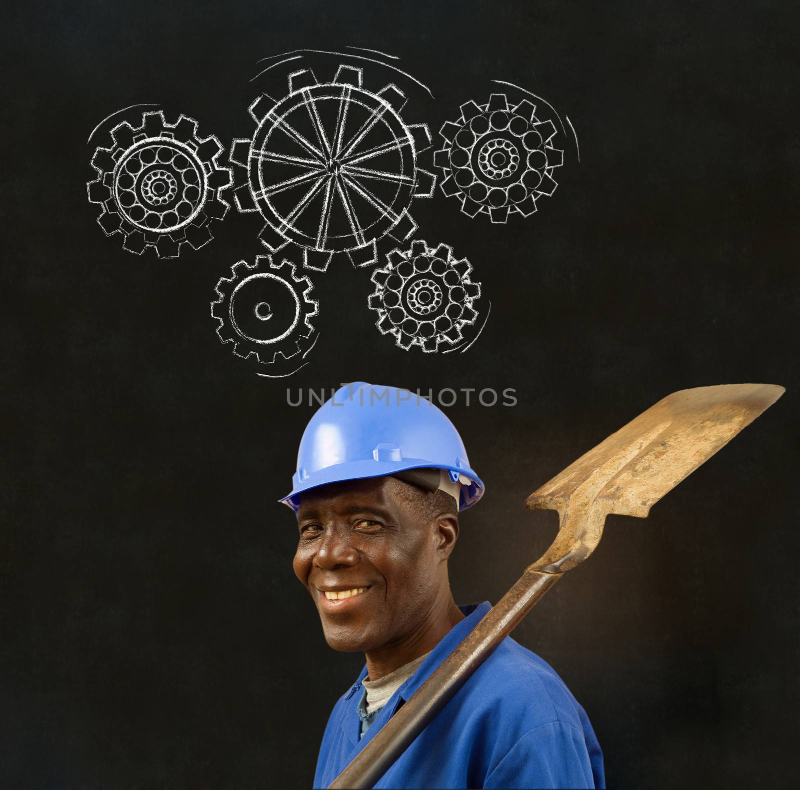 African black man worker with chalk gears blackboard by alistaircotton