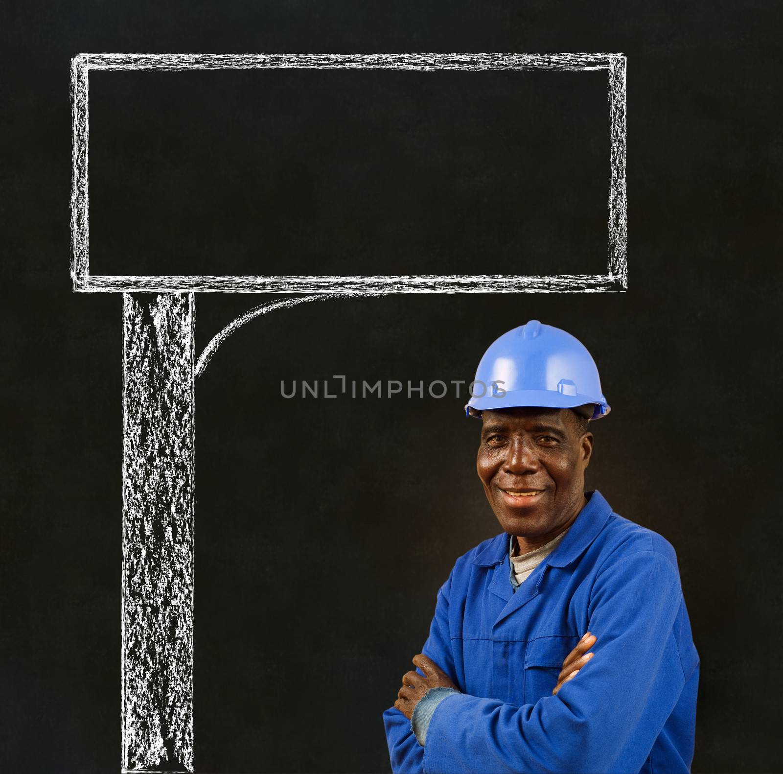 African American black man worker with a chalk road advertising sign on a blackboard background