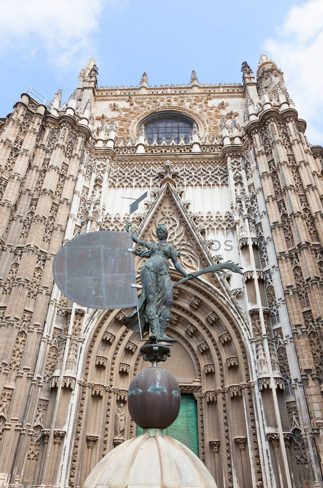 Fragment of a facade of a cathedral in Seville, Spain