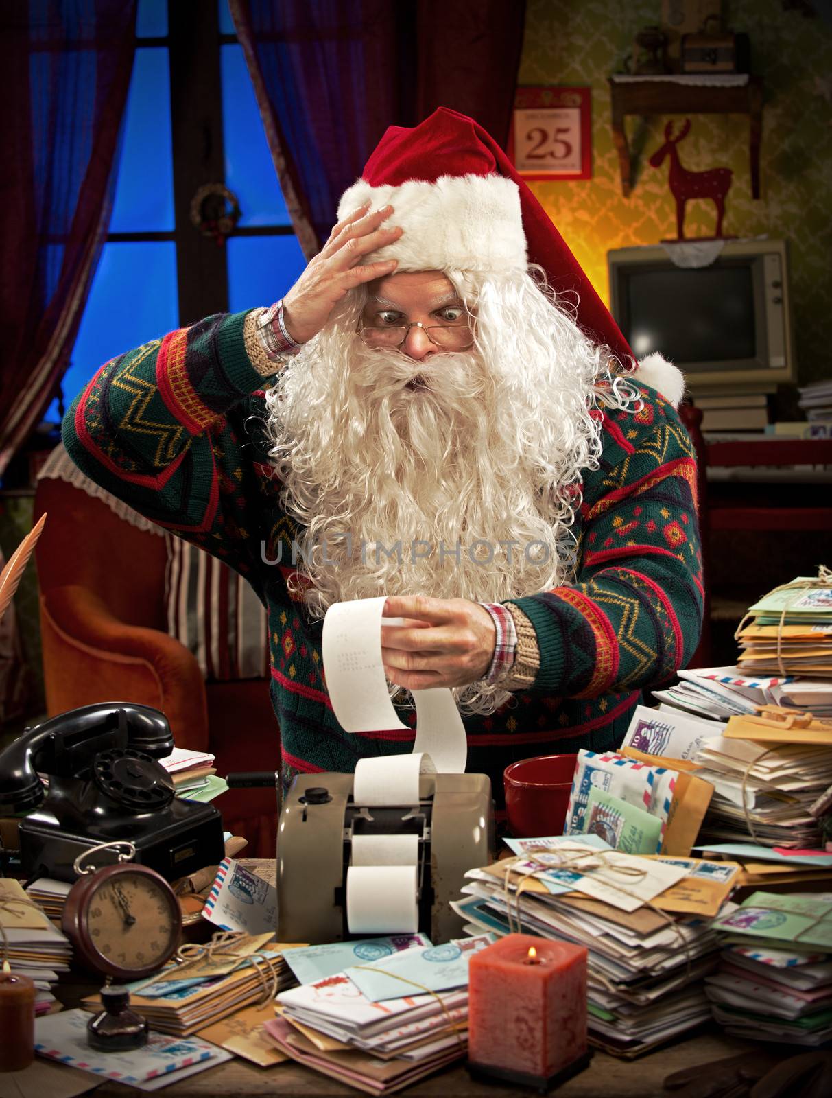 Santa Claus accountant going over figures and very upset by the result.