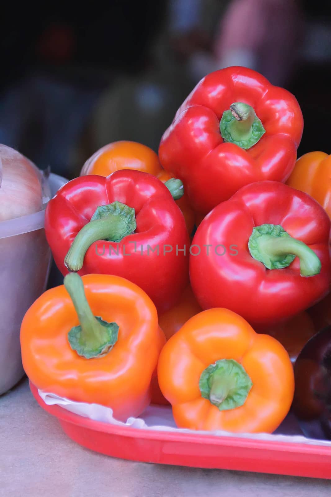 Image of red and yellow raw pepper