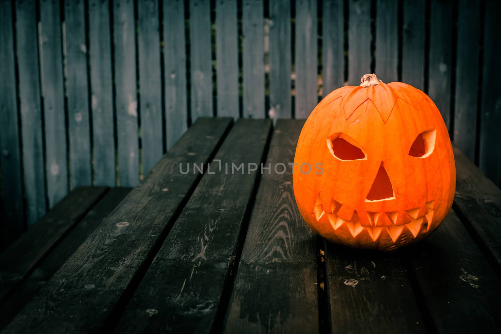 Jack-o-lantern pumpkin head at halloween