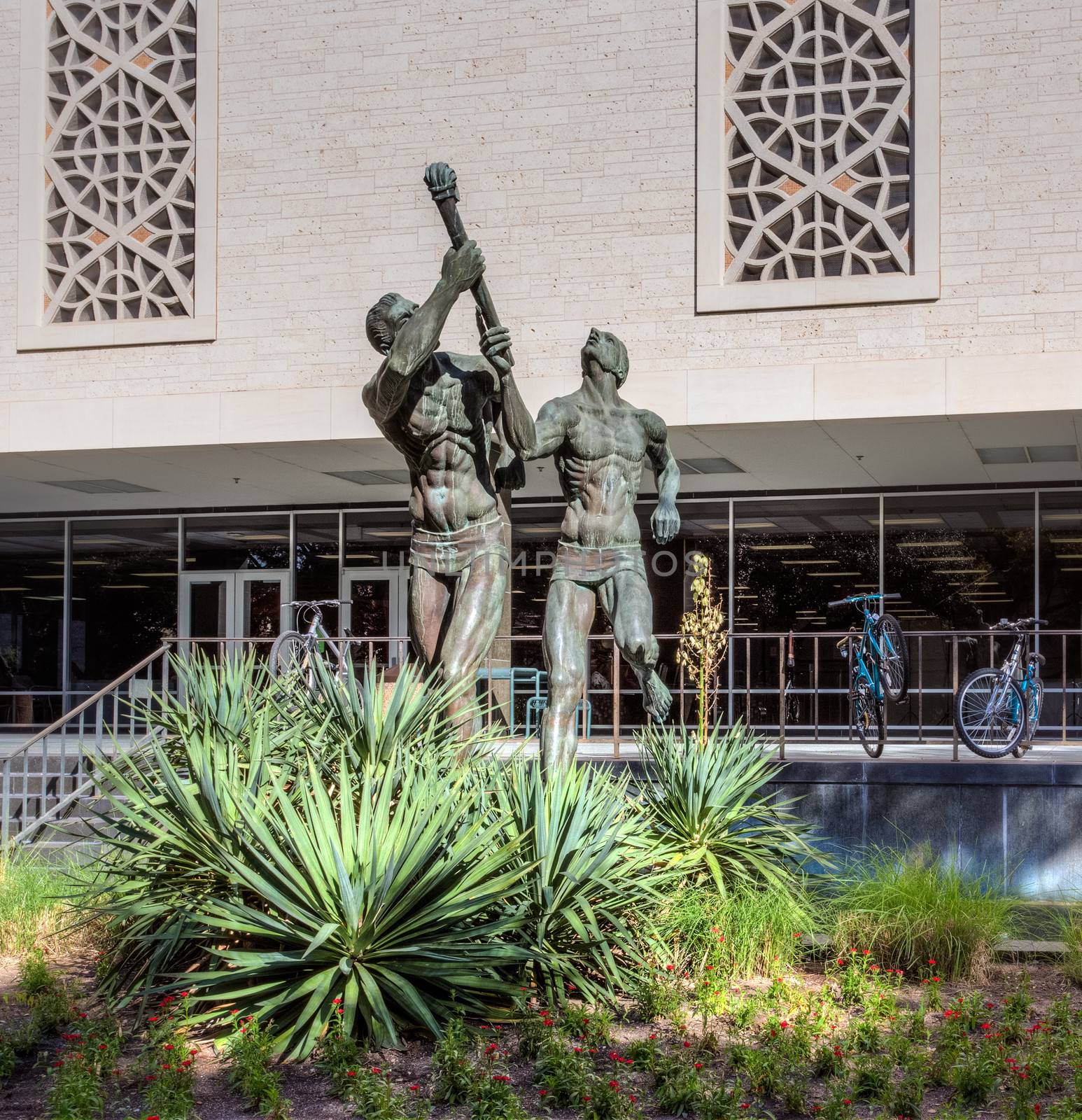 AUSTIN,TX/USA - NOVEMBER 14:  The Torchbearers Sculpture on the campus of the University of Texas, a state research university and the flagship institution of the The University of Texas System. November 14, 2013.