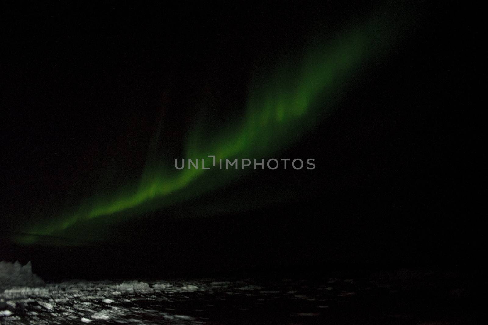 Northern lights over Disko Bay in Greenland