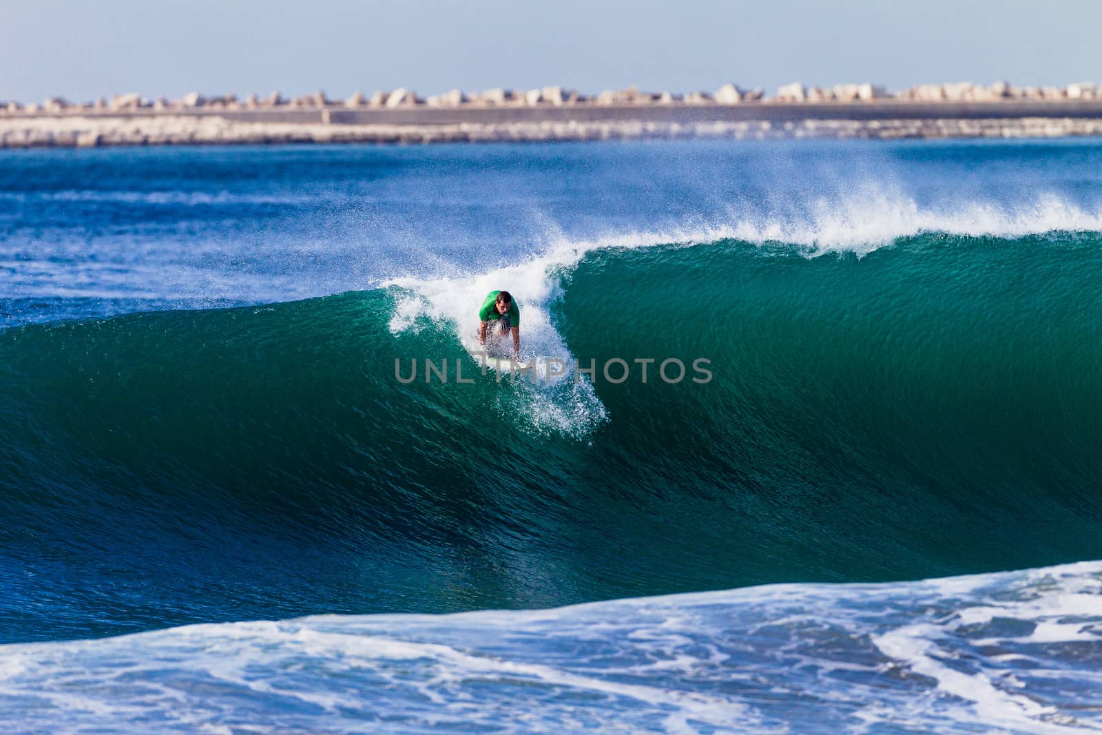 Surfer Catching Wave by ChrisVanLennepPhoto