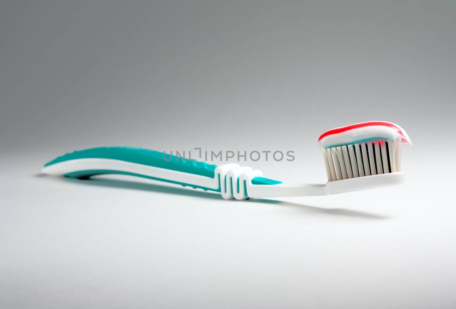 Toothbrush with toothpaste by dedmorozz