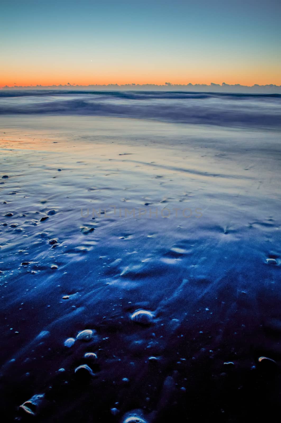 early morning on a sea coast beach scene