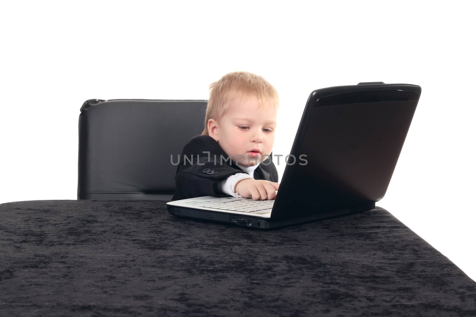 Little businessman working with computer