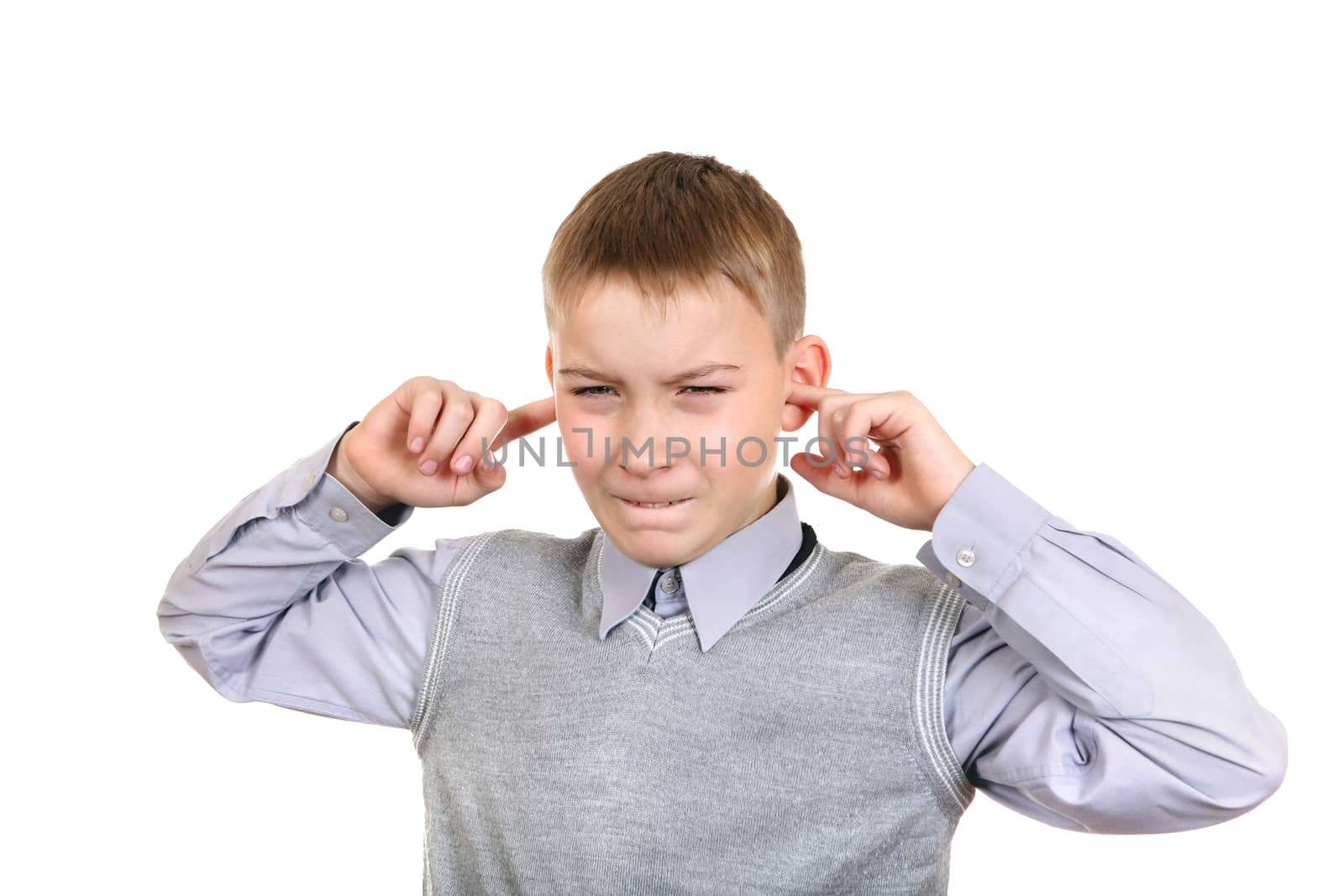 Displeased Boy covering his Ears from the Noise. Isolated on the White Background