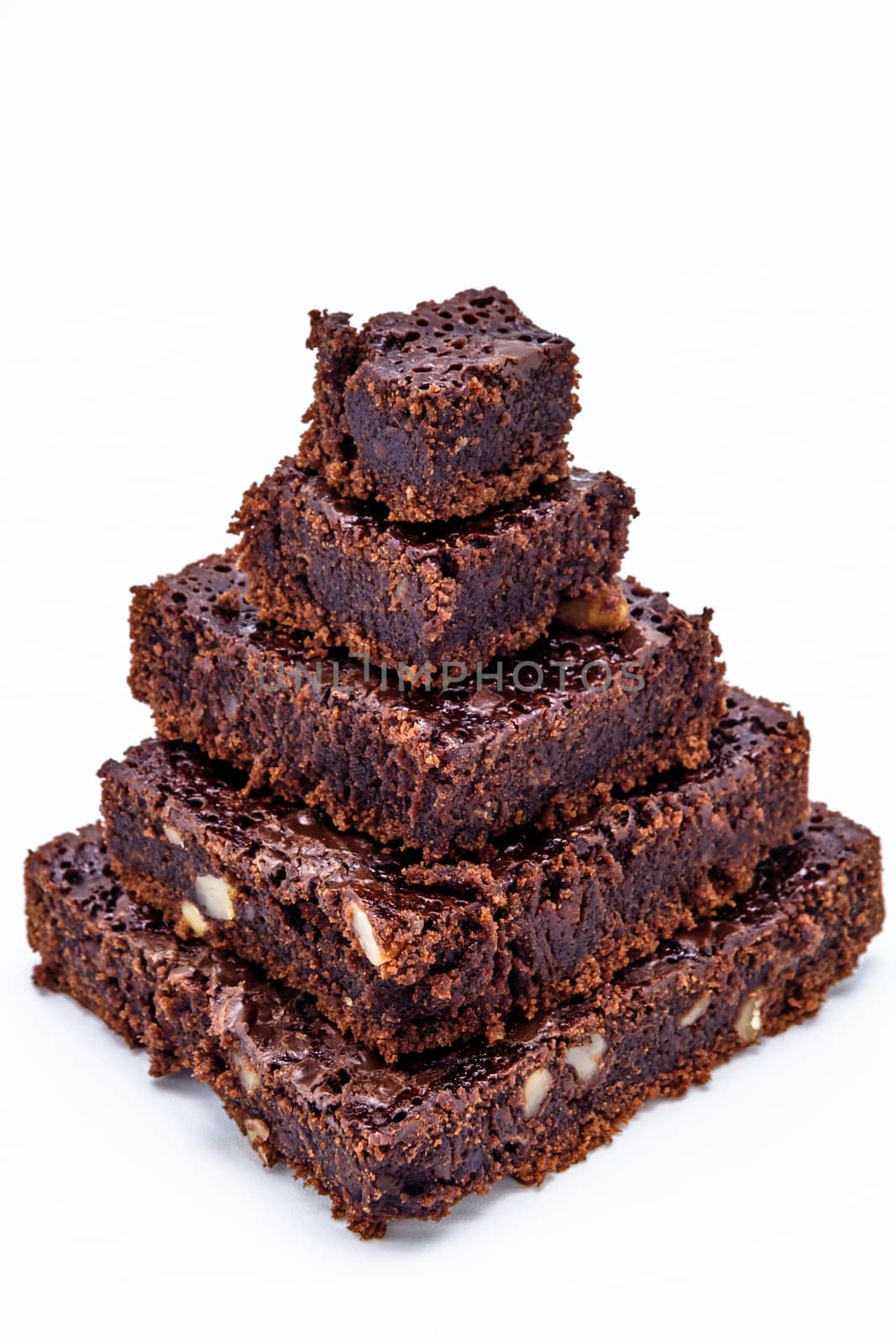 One pyramid of brownies on a white background