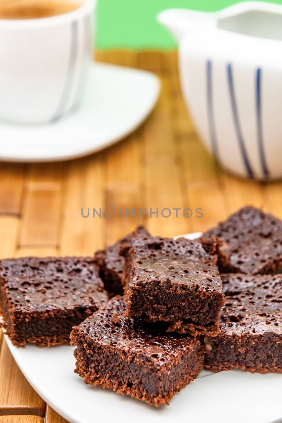 Chocolate brownies with coffee, selective focus