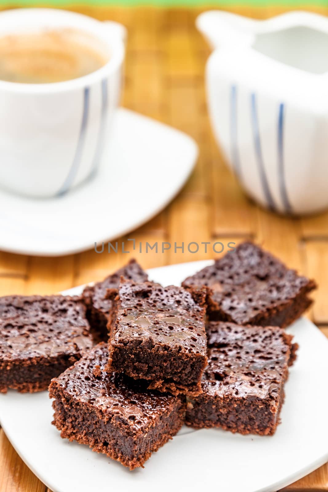 Chocolate brownies with coffee, selective focus