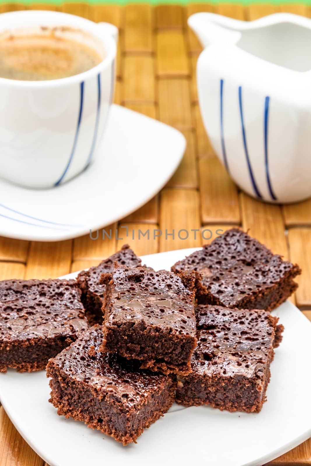 Chocolate brownies with coffee, selective focus