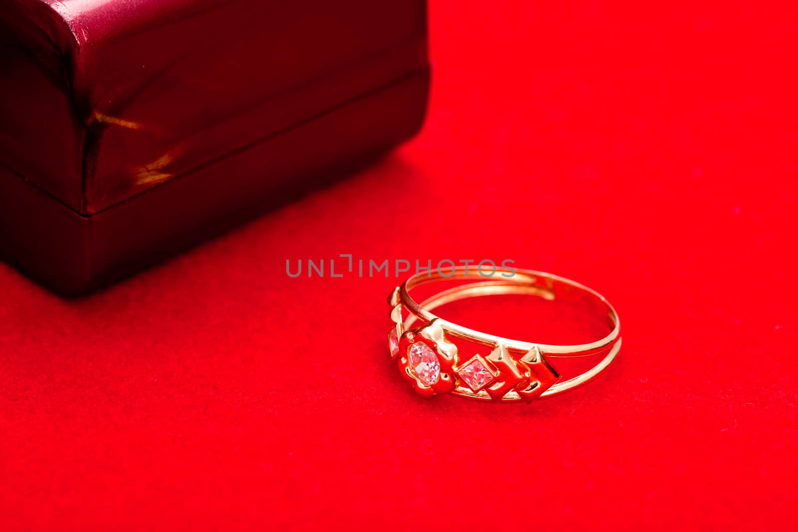 Fantastic gold ring adorned with several white zirconia