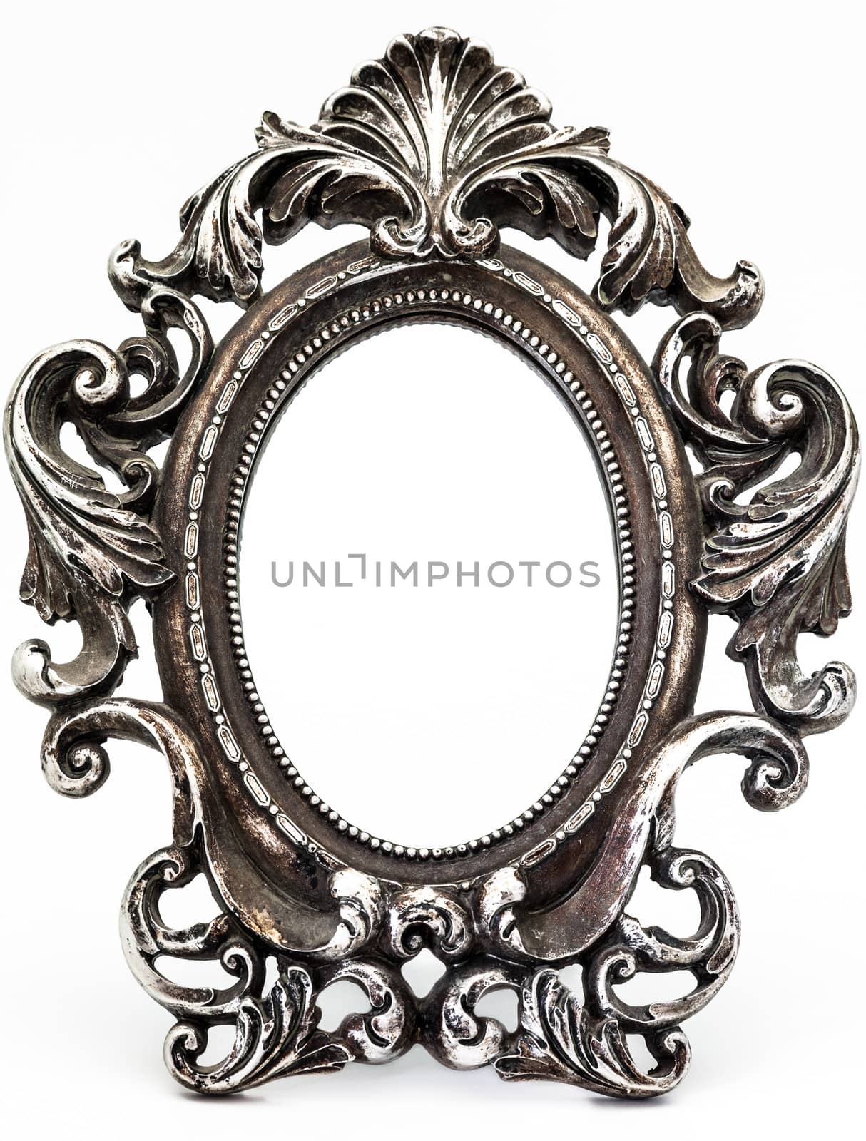 Fantastic vintage silver-plated mirror on a white background