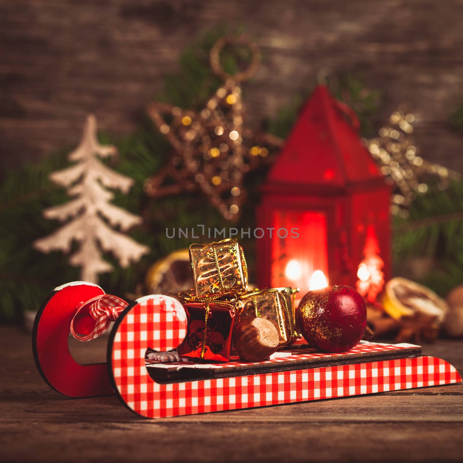 Decorative boxes and nuts on the sledges. Symbols of Christmas holiday