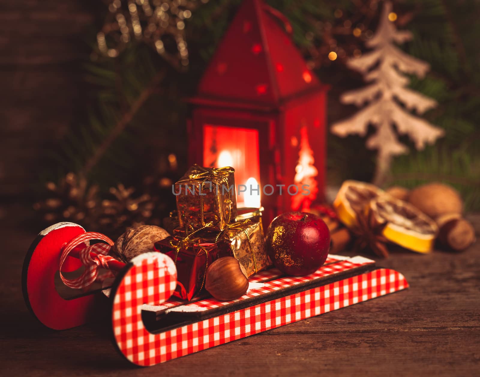 Decorative boxes and nuts on the sledges. Symbols of Christmas holiday