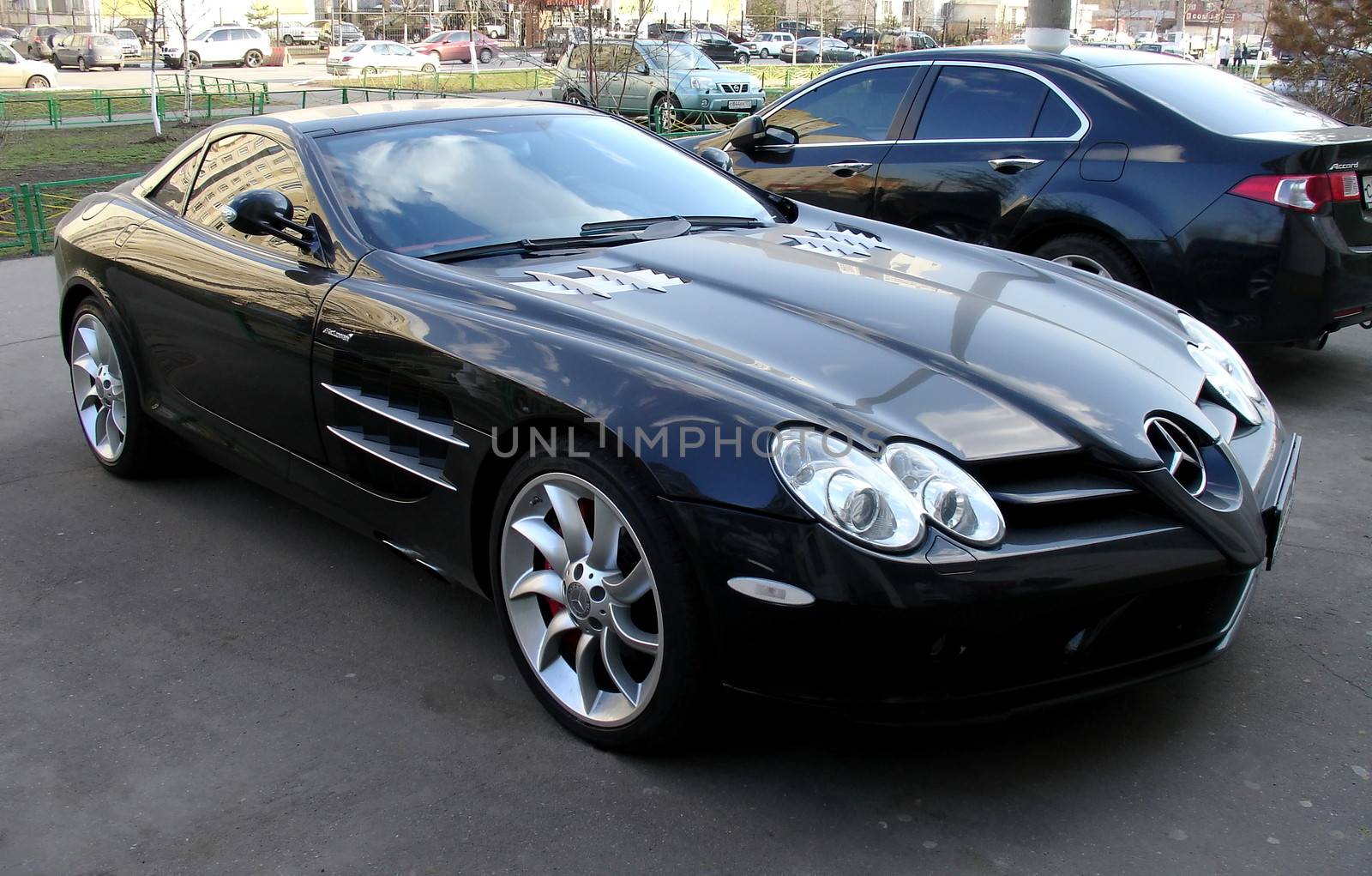 Luxury black Mercedes Benz McLaren SLR on street