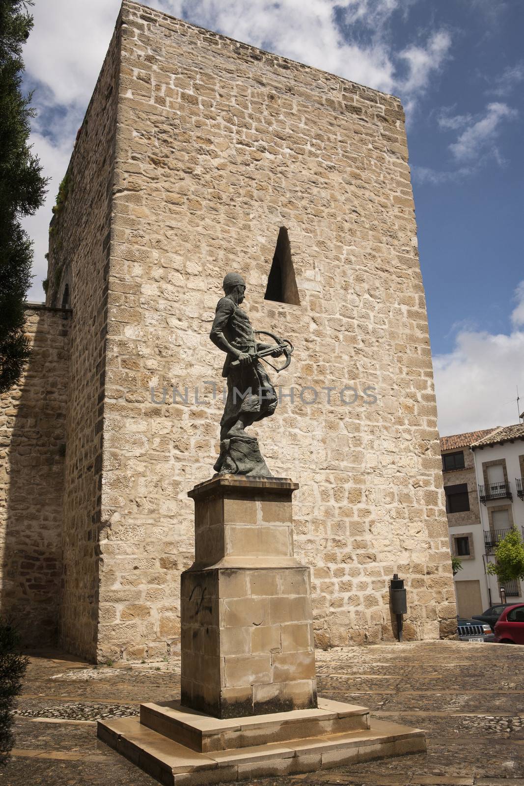 Monument tribute to the Company of the two hundred Ballesteros of Mr Santiago, represents a warrior, armed crossbow, Baeza, World Heritage city by UNESCO, Jaen province, Andalusia, Spain