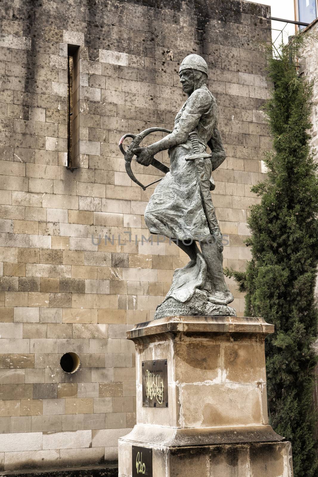 Monument tribute to the Company of the two hundred Ballesteros of Mr Santiago, represents a warrior, armed crossbow, Baeza, World Heritage city by UNESCO, Jaen province, Andalusia, Spain