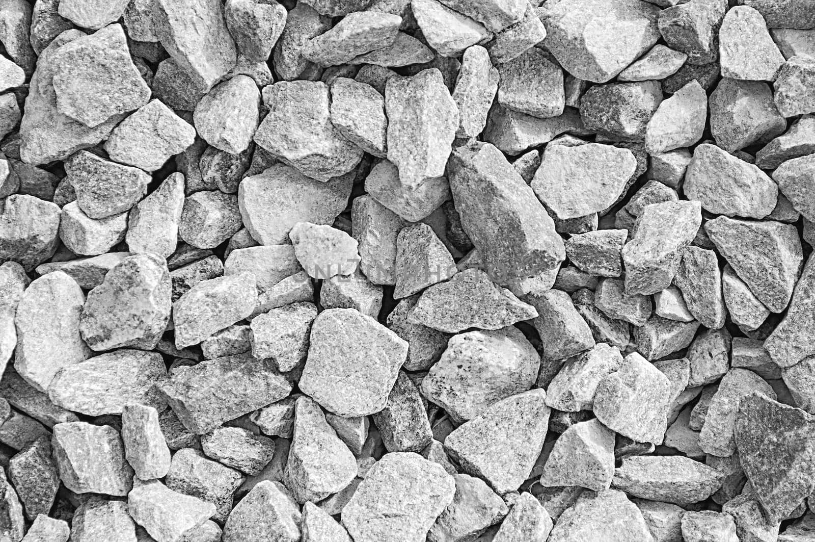 Close up of gray gravel background, black and white