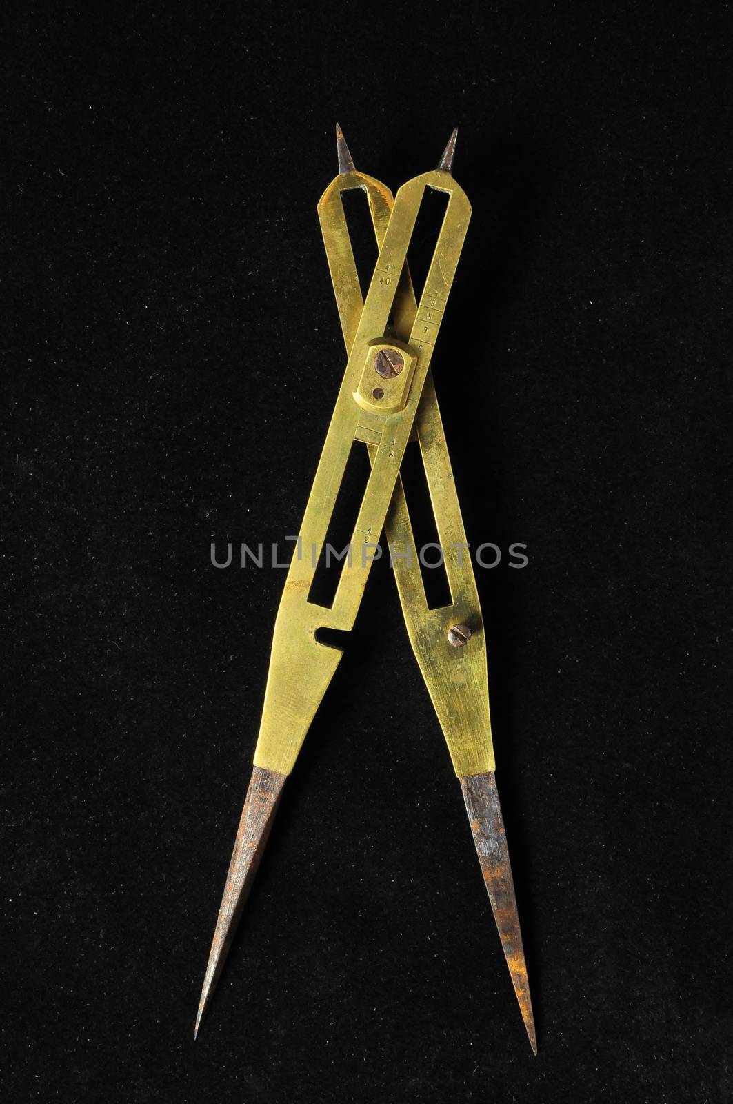 Vintage Angle Measuring Tool on a Black Background