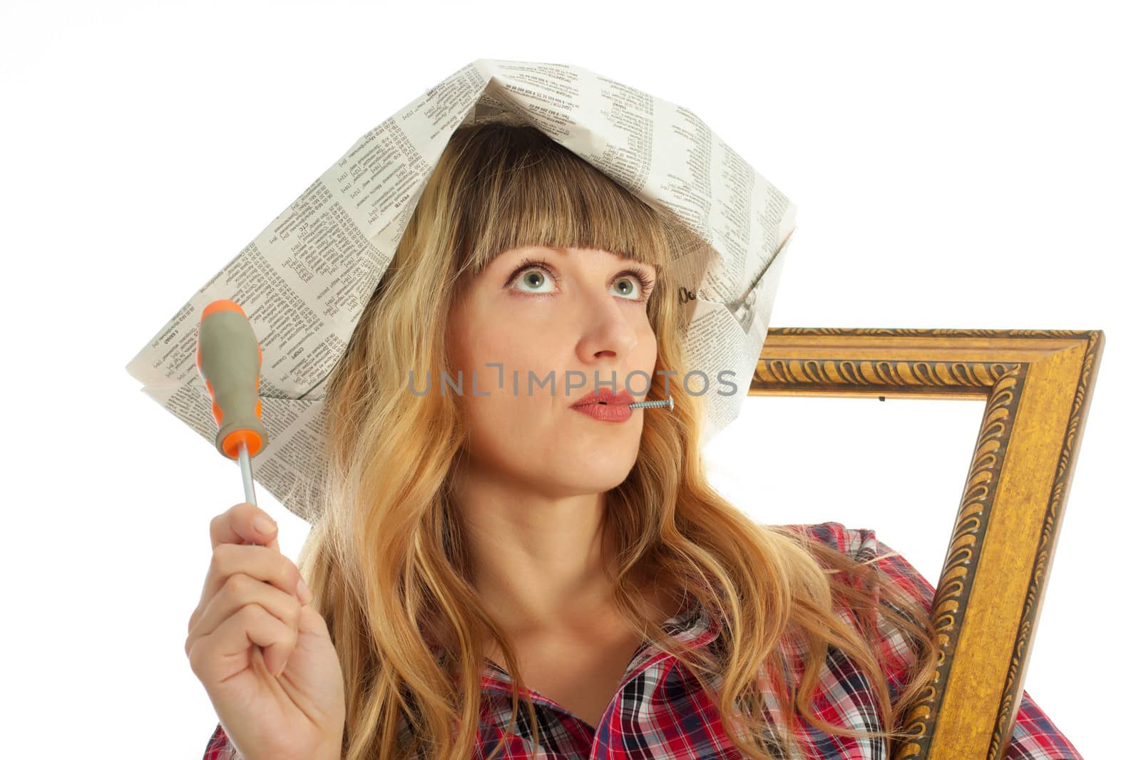 Woman engaged in small home repair on a white background